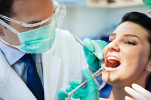 patient receives an injection at the dentist